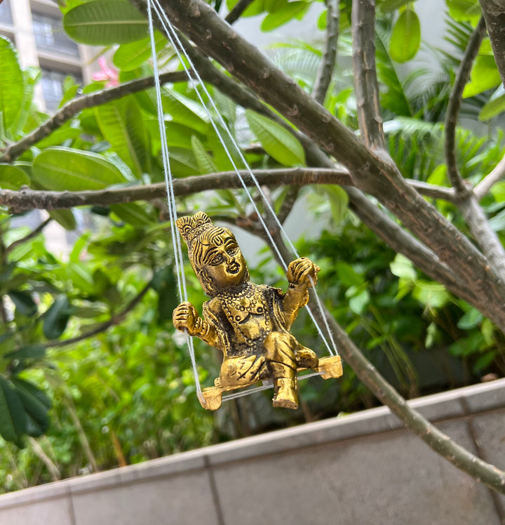 Gold Plated Krishna Idol with attached Jhula