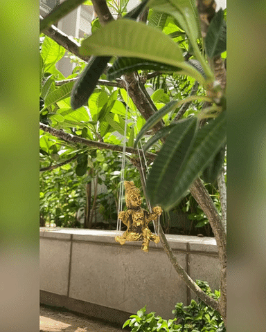 Gold Plated Krishna Idol with attached Jhula